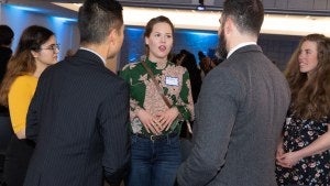 Attendees at the 2024 Fulbright and Chicago Council Extravaganza standing and talking to each other.