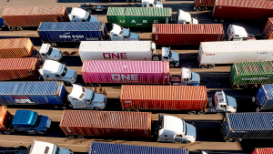 Trucks line up to enter a Port of Oakland shipping terminal on Nov. 10, 2021, in Oakland, California.