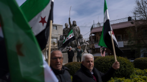 People participate in a rally in the town of Majdal Shams, close to the Syrian border, demanding Israel return the annexed Golan Heights to Syria on February 14, 2025.