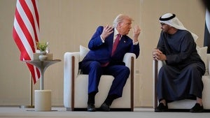 President Donald Trump and UAE President Sheikh Mohammed bin Zayed Al Nahyan talk during a welcome ceremony at Abu Dhabi International Airport