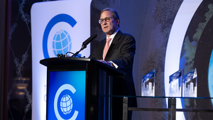 John Ettelson speaks during the 2024 Global Leadership Awards Dinner.