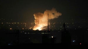 Smoke rises up after an explosion in Tehran, Iran