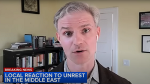 Paul Poast speaks via a video call