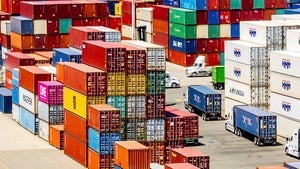 Cargo containers line a shipping terminal at the Port of Oakland on July 31, 2025.