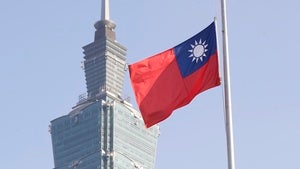 A Taiwan national flag flutters near the Taipei 101 building at the National Dr. Sun Yat-Sen Memorial Hall in Taipei, Taiwan on February 28, 2025.