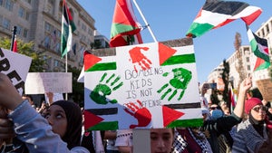 People protest the war in Gaza at Lafayette Park across from the White House