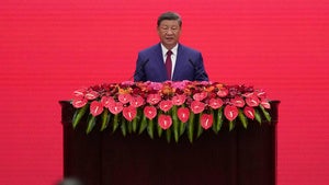 Chinese President Xi Jinping addresses a reception following a military parade