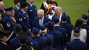 Britain's King Charles III and President Donald Trump speak to military personnel at Windsor Castle, England, on September 17, 2025.