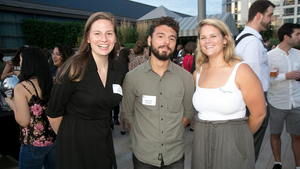 Three Council event attendees pose for a photo.