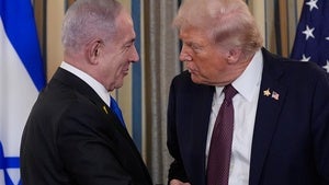 Israel's Prime Minister Benjamin Netanyahu shakes hands with President Donald Trump after a news conference at the White House on September 29, 2025.