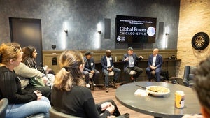 YP Network members gathered listening to George Chiampas, Wesley Korir, Carey Pinkowski