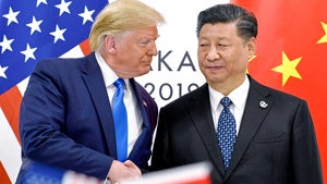  President Donald Trump shakes hands with China's President Xi Jinping