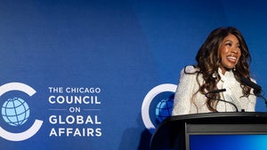 A person speaks at a podium