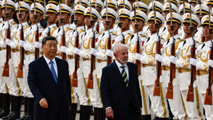 Chinese President Xi Jinping and Brazil's President Luiz Inacio Lula da Silva walk past the honor guard during a welcome ceremony at the Great Hall of the People in Beijing, China on May 13, 2025.