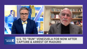 Bruce Jentleson speaks with a journalist on Spectrum News 1