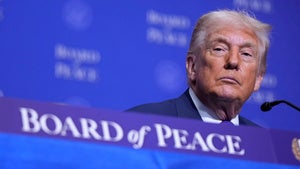 President Donald Trumpl listens during a Board of Peace meeting at the U.S. Institute of Peace