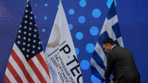 US, Partnership for Transatlantic Energy Cooperation, and Greek Flags