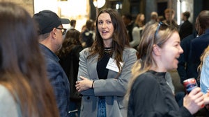 Attendees mingling at a YP Network reception.