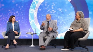 Speakers on the Council's stage