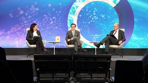 Speakers on the Council's stage