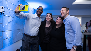 A group of Emerging Leaders pose for a selfie photo at a Council event.