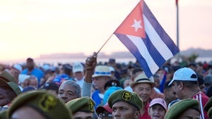 Members of the Revolutionary Armed Forces attend a rally in support of former President Raul Castro
