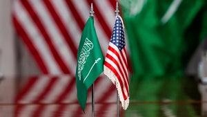 American and Saudi Arabia flags