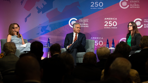 Panel of speakers on a stage