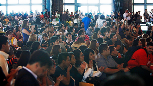 A crowd of people sitting at an immigrant assistance event at Navy Pier on August 15, 2012.
