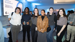 A group of Council event attendees pose for a photo together.