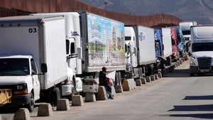 Trucks line up to cross the border into the United States