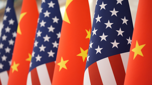 American and Chinese Flags in a row.
