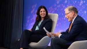 Leslie Vinjamuri and Michael H. Moskow on the Council stage.