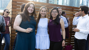 Members of the Young Professionals Network pose for a photo at a summer 2026 happy hour event.