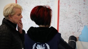 Cindy McCain looks at a map of Eastern Europe