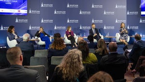 Speakers on stage at the Warsaw Security Forum
