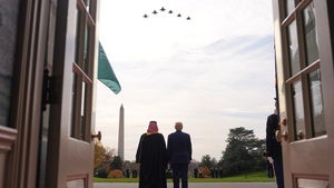 President Donald Trump and Saudi Arabia's Crown Prince Mohammed bin Salman watch a flight of F-35's and F-15's fly over during a welcome ceremony on the South Lawn of the White House, Tuesday, Nov. 18, 2025, in Washington.