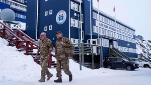 Danish servicemen walk in front of Joint Arctic Command center in Nuuk, Greenland, on Friday, Jan. 16, 2026. 