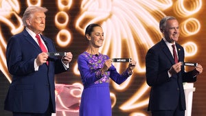 President Donald Trump, Mexican President Claudia Sheinbaum and Canadian Prime Minister Mark Carney hold their countries' cards during the draw for the 2026 soccer World Cup at the Kennedy Center in Washington, Friday, Dec. 5, 2025