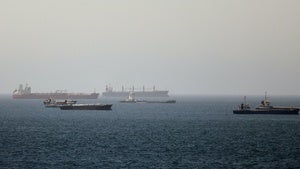 Tankers and cargo vessels are seen in the Gulf of Oman, along shipping routes linking the Strait of Hormuz and the Arabian Sea, Tuesday, June 16, 2026.