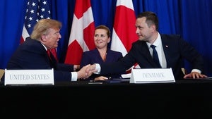 President Donald Trump shakes hands with Greenland's Prime Minister Jens-Frederik Nielsen, before signing a security agreement during the United Nations General Assembly, Tuesday, Sept. 22, 2026, at the UN headquarters, as Denmark's Prime Minister Mette Frederiksen, center, looks on.