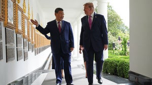 President Donald Trump and China's President Xi Jinping walk along the Colonnade of the White House, Thursday, Sept. 24, 2026, in Washington. 