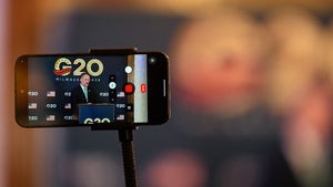 A phone records U.S. Trade Representative Jamieson Greer speaking during a press conference Thursday, Oct. 1, 2026, at the G20 Trade Ministerial in Milwaukee, Wis.